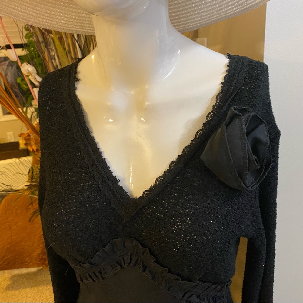 Beautiful black dress. Long sleeves with delicate lace